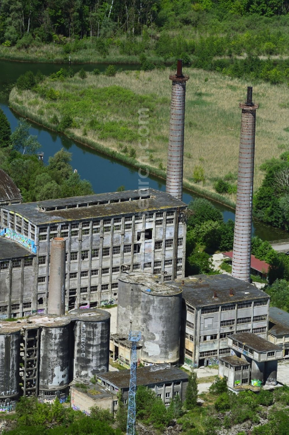 Rüdersdorf from the bird's eye view: Ruin the buildings and halls of Cement and phosphate chemical plant in the district Tasdorf in Ruedersdorf in the state Brandenburg, Germany