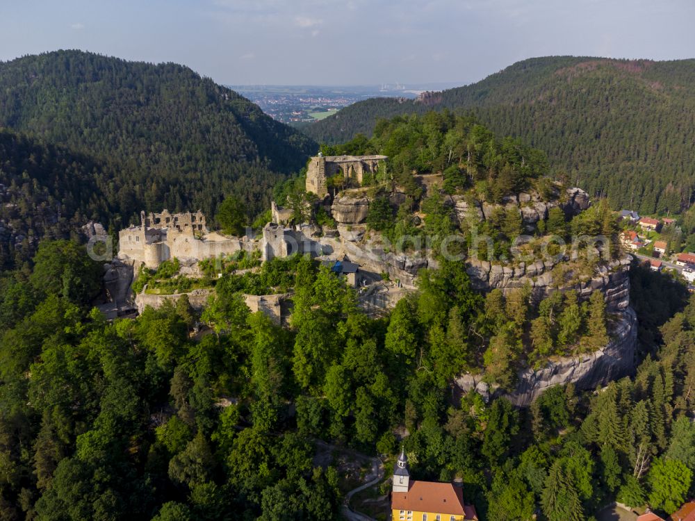 Kurort Oybin from above - Ruins and vestiges of the former castle Burg and Kloster Oybin on street Hauptstrasse in Kurort Oybin in the state Saxony, Germany