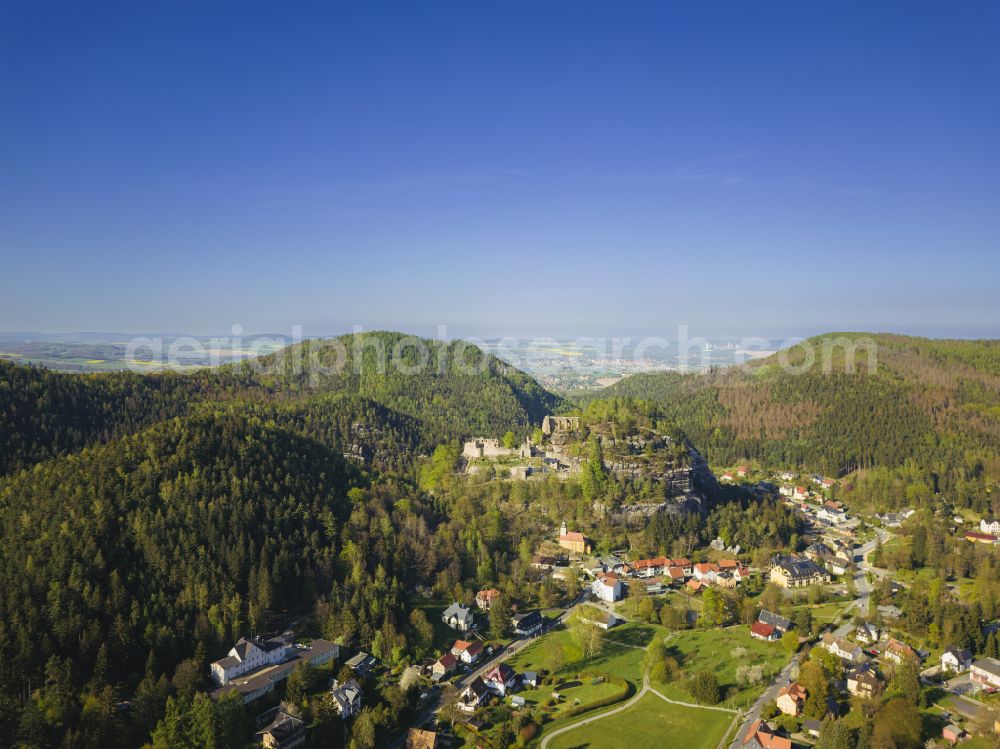 Kurort Oybin from above - Ruins and vestiges of the former castle Burg and Kloster Oybin on street Hauptstrasse in Kurort Oybin in the state Saxony, Germany