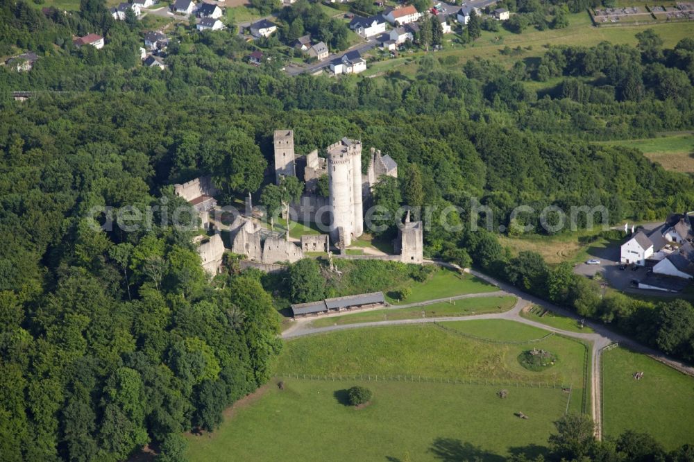 Pelm from above - Ruins and vestiges of the former castle and fortress Kasselburg in Pelm in the state Rhineland-Palatinate, Germany. The castle is part of the eagle and wolf park of the Vulkaneifel region