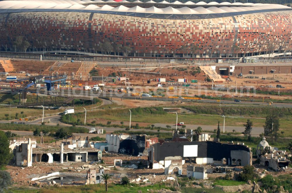 Aerial image Johannesburg - Ruins near the FNB Stadium, or Soccer City Stadium, in Johannesburg. The FNB Stadium is the largest football stadium in South Africa and was a venue of the Football World Cup in 2010