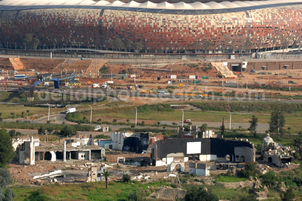 Aerial photograph Johannesburg - Ruins near the FNB Stadium, or Soccer City Stadium, in Johannesburg. The FNB Stadium is the largest football stadium in South Africa and was a venue of the Football World Cup in 2010