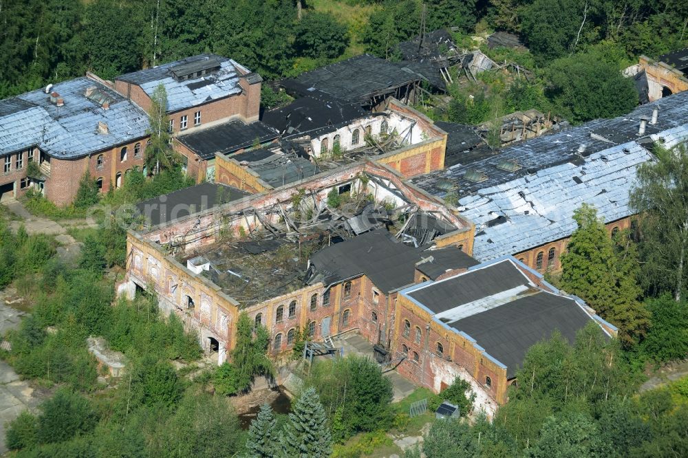 Wolkenburg from above - Ruins of the paper factory in Wolkenburg in the state of Saxony. Caved-in roofs and remains of walls are visible