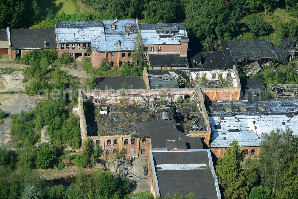 Wolkenburg from the bird's eye view: Ruins of the paper factory in Wolkenburg in the state of Saxony. Caved-in roofs and remains of walls are visible