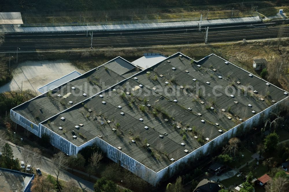 Mühlenbecker Land from the bird's eye view: Ruins of dilapidated warehouses and forwarding building der DDR- Stasi Firma KuA GmbH an der Kastanienallee in Muehlenbeck in the state Brandenburg