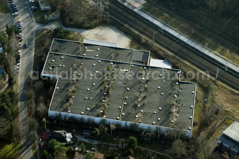 Aerial photograph Mühlenbecker Land - Ruins of dilapidated warehouses and forwarding building der DDR- Stasi Firma KuA GmbH an der Kastanienallee in Muehlenbeck in the state Brandenburg