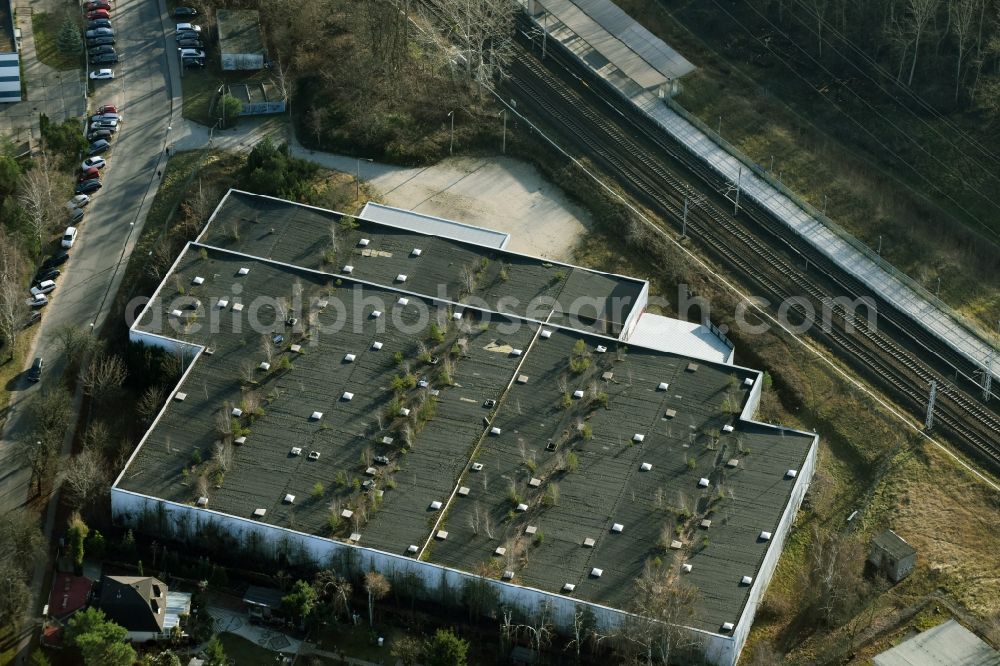 Aerial image Mühlenbecker Land - Ruins of dilapidated warehouses and forwarding building der DDR- Stasi Firma KuA GmbH an der Kastanienallee in Muehlenbeck in the state Brandenburg