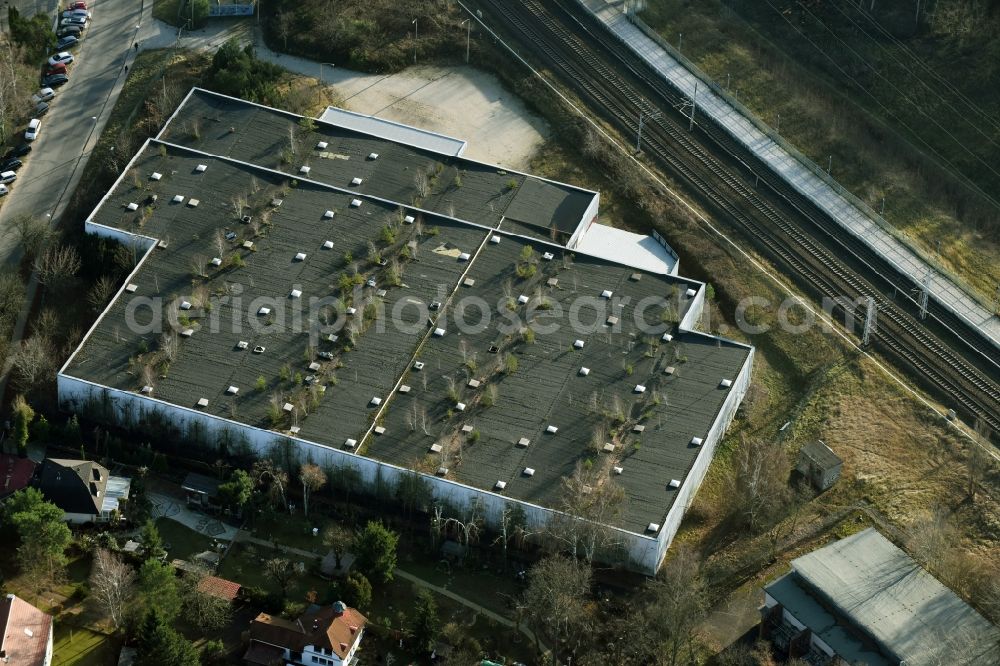 Aerial photograph Mühlenbecker Land - Ruins of dilapidated warehouses and forwarding building der DDR- Stasi Firma KuA GmbH an der Kastanienallee in Muehlenbeck in the state Brandenburg