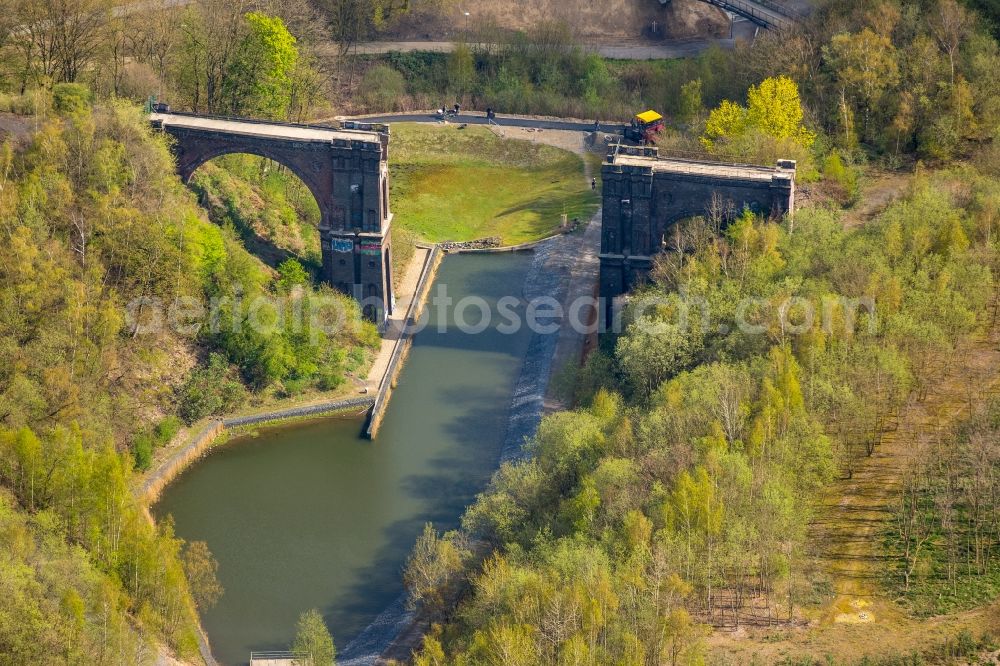 Dortmund from above - Between the old blast furnace terrain Phoenix-West and Phoenix Lake in Dortmund, the remnants of the old slag path, the ruin of the viaduct of the bridge in Hympendahl Dortmund in North Rhine-Westphalia found