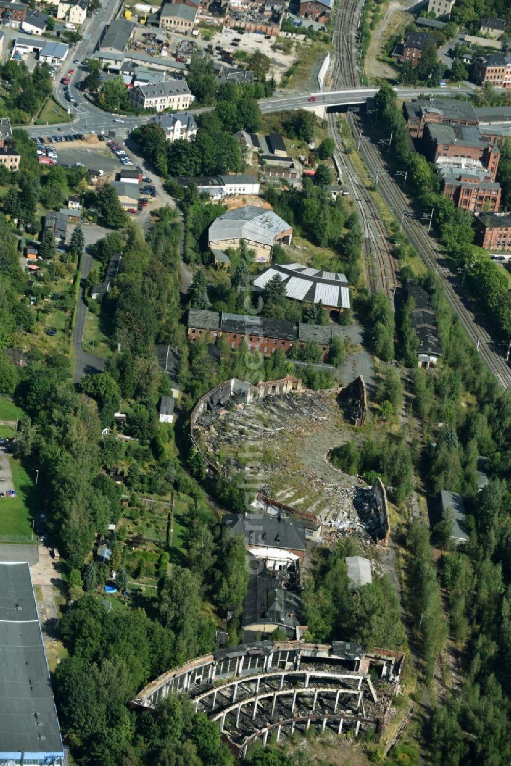 Mylau from above - Remains of Trackage and rail routes on the roundhouse - locomotive hall of the railway operations work in der Friedensstrasse der Deutschen Bahn in Mylau in the state Saxony