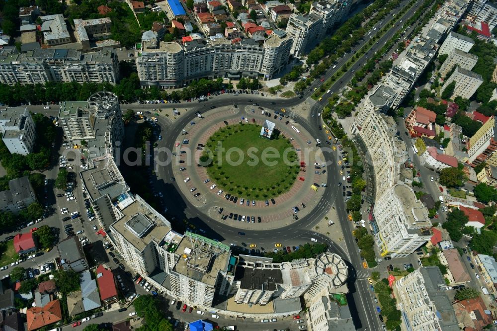 Bukarest from the bird's eye view: View of the Round Square Piata Alba Iulia in the city center of Bucharest in Romania. The embossed in the style of Stalinist-dominated socialist architectural style houses line the streets and were up in the 70s of the previous century as a showpiece of socialist architecture