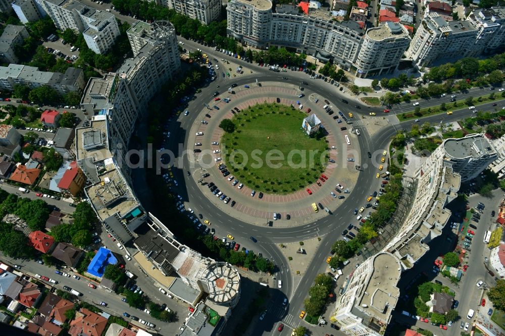 Aerial image Bukarest - View of the Round Square Piata Alba Iulia in the city center of Bucharest in Romania. The embossed in the style of Stalinist-dominated socialist architectural style houses line the streets and were up in the 70s of the previous century as a showpiece of socialist architecture