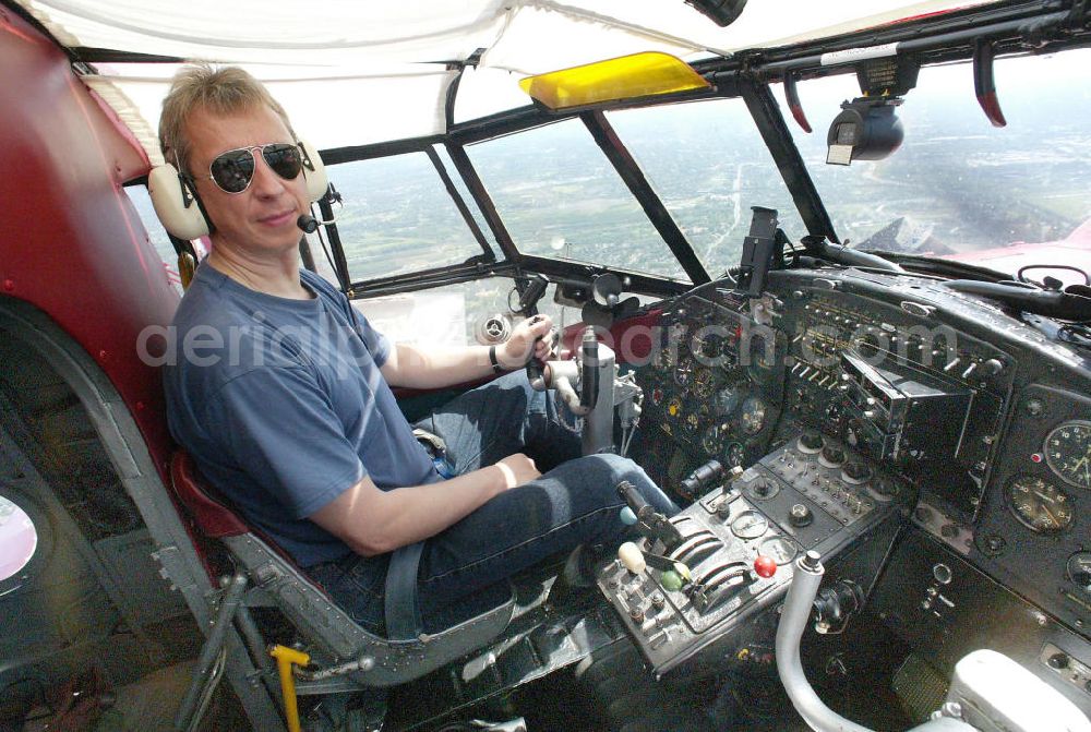 Aerial image Oberhausen - Rundflug mit einem Doppeldecker- Flugzeug vom Typ Antonow AN-2 über dem Centro- Einkaufzentrum Oberhausen. Die AN-2 ist der größte noch fliegende Doppeldecker der Welt. Flight with a double-decker aircraft Antonov AN-2 above the Centro Shopping Centre Oberhausen. The AN-2 biplane flying still the largest in the world.