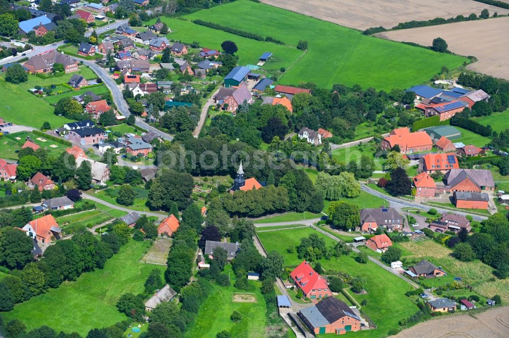 Brunstorf from above - Village view with radiating round - shaped farmsteads and residential buildings in the center of the village in Brunstorf in the state Schleswig-Holstein, Germany