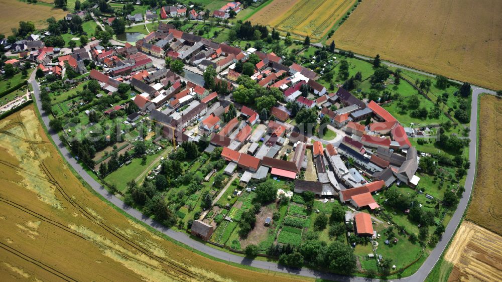 Aerial image Ebersroda - Village view with radiating round - shaped farmsteads and residential buildings in the center of the village on street Dorfstrasse in Ebersroda in the state Saxony-Anhalt, Germany