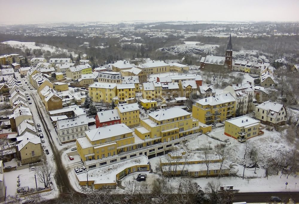 Aerial image Halle (Saale) - On a plot between Kroellwitzer Street and at St. Peter's Church in Halle (Saale) in Saxony-Anhalt emerged in the last few years, a modern complex with medical specialists and senior care facilities. In Medikum Kroellwitz there is a day care, a retirement home and a home care service. In the background St. Peter's Church can be seen