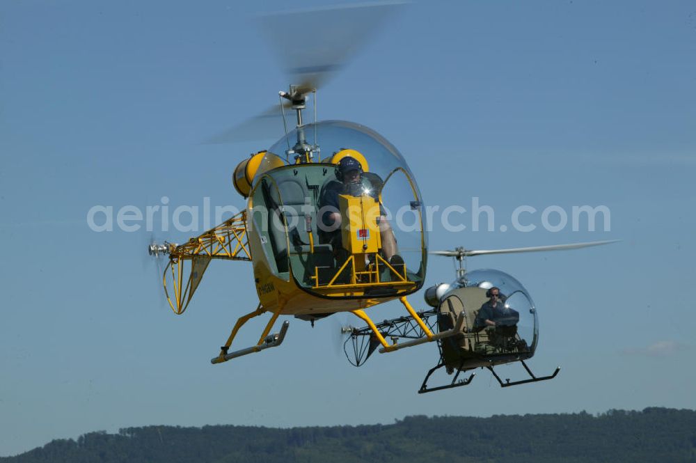 Lahr / Schwarzwald from above - Zwei Hubschrauber / Helikopter vom Typ Safari Helicopter nahe dem Flughafen Black Forest Airport Lahr in Baden-Württemberg. Two Helicopters near by the Lahr Airport in Baden-Wuerttemberg.