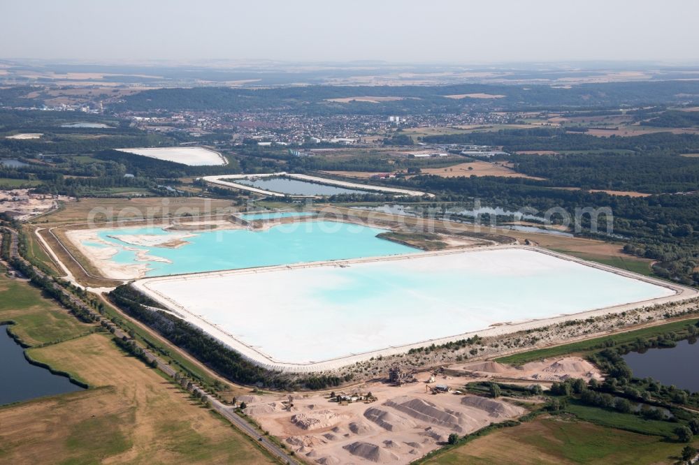 Rosières-aux-Salines from the bird's eye view: Brown - white salt pans for salt extraction in RosiA?res-aux-Salines in Alsace-Champagne-Ardenne-Lorraine, France