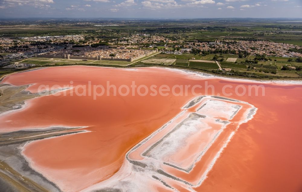 Aerial image Aigues-Mortes - Red - Organge Salinen- landscape for sea salt production in Aigues-Mortes in the province of Languedoc-Roussillon in France