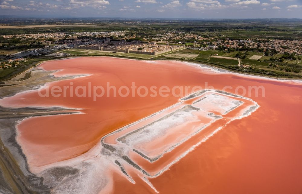 Aerial photograph Aigues-Mortes - Red - Organge Salinen- landscape for sea salt production in Aigues-Mortes in the province of Languedoc-Roussillon in France