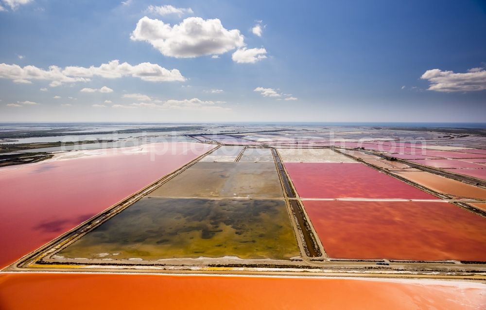 Aigues-Mortes from the bird's eye view: Red - Organge Salinen- landscape for sea salt production in Aigues-Mortes in the province of Languedoc-Roussillon in France