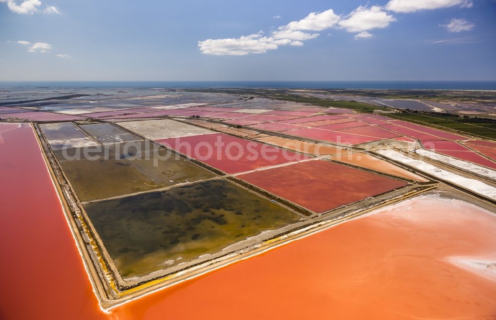 Aerial photograph Aigues-Mortes - Red - Organge Salinen- landscape for sea salt production in Aigues-Mortes in the province of Languedoc-Roussillon in France