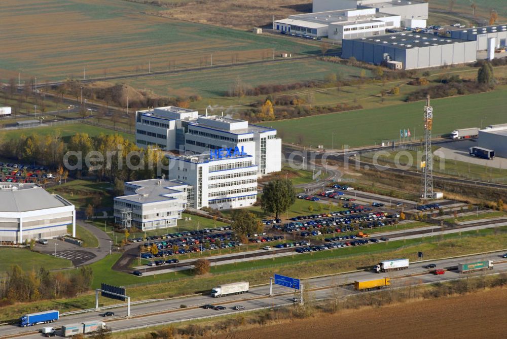 Aerial photograph Barleben - Blick auf das Areal der Salutas Pharma GmbH in Barleben mit dem zugehörigen Unternehmen Hexal. Salutas entwickelt, fertigt, lagert und versendet hochwertige Pharmazeutika in einem der modernsten Pharmaproduktions- und Logistikzentren Europas. Das 1995 nach Investitionen von umgerechnet rund 170 Millionen Euro in Vollbetrieb genommene Werk ist mit derzeit 1.400 Mitarbeiter(innen) und Arbeitgebern ein bedeutender Wirtschaftsfaktor für das Land Sachsen-Anhalt. Kontakt: SALUTAS Pharma GmbH, Otto-von-Guericke Allee 1, 39179 Barl???????????????????????????????????????????