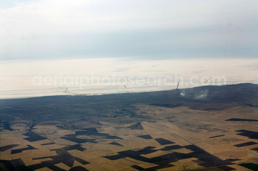 Aerial photograph Sereflikochisar - View of the Salt Lake / Tuz Gölü near Sereflikochisar in the province / Il Ankara in Turkey / Türkiye. Seen in the picture is one of three at the salt lake located salt factories, where 70 percent of the salt consumed in Turkey is produced