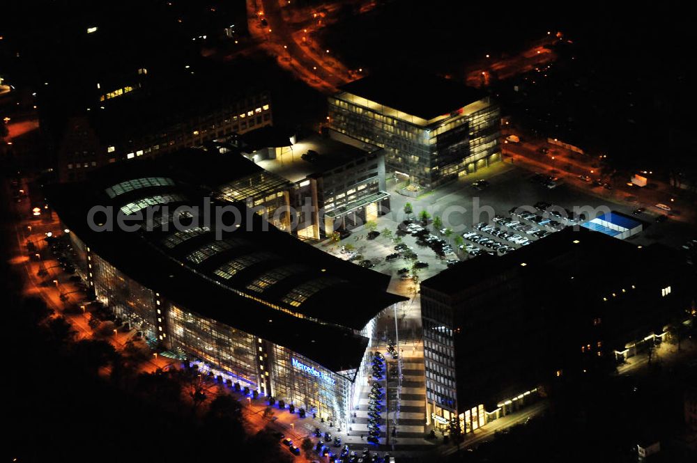 Berlin from above - Nachtaufnahme: Mercedes Welt am Salzufer in Berlin Charlottenburg mit Beleuchtung anläßlich des Festival of Lights. Night Shot: Mercedes World at the Salzufer street in Berlin with illumination during the Festival of Lights.