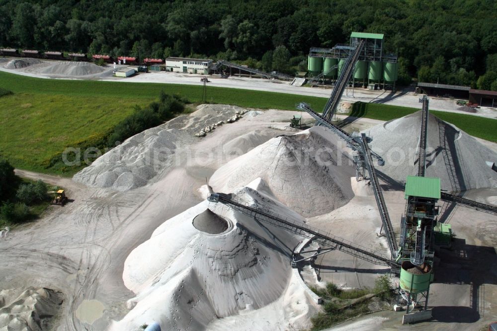 Hagenbach from above - Piles of sand and gravel on site of the gravel mining WOLFF & MUeLLER Baustoffe in Hagenbach in the state Rhineland-Palatinate