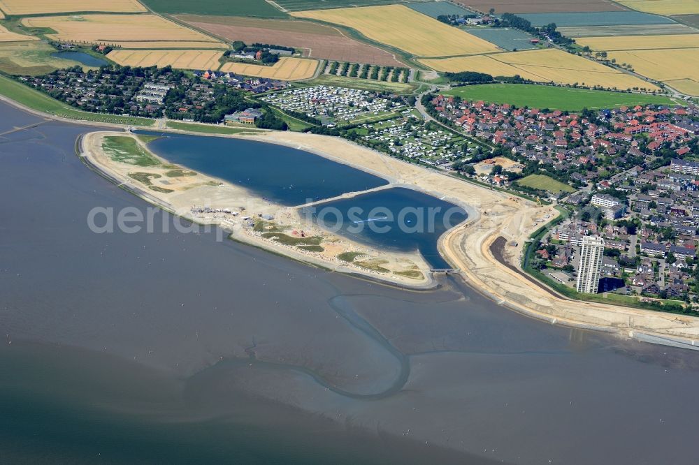 Büsum from above - Sandy beach in the coastal area of family lagoon pearl bay in the Wadden Sea in Buesum in Schleswig-Holstein