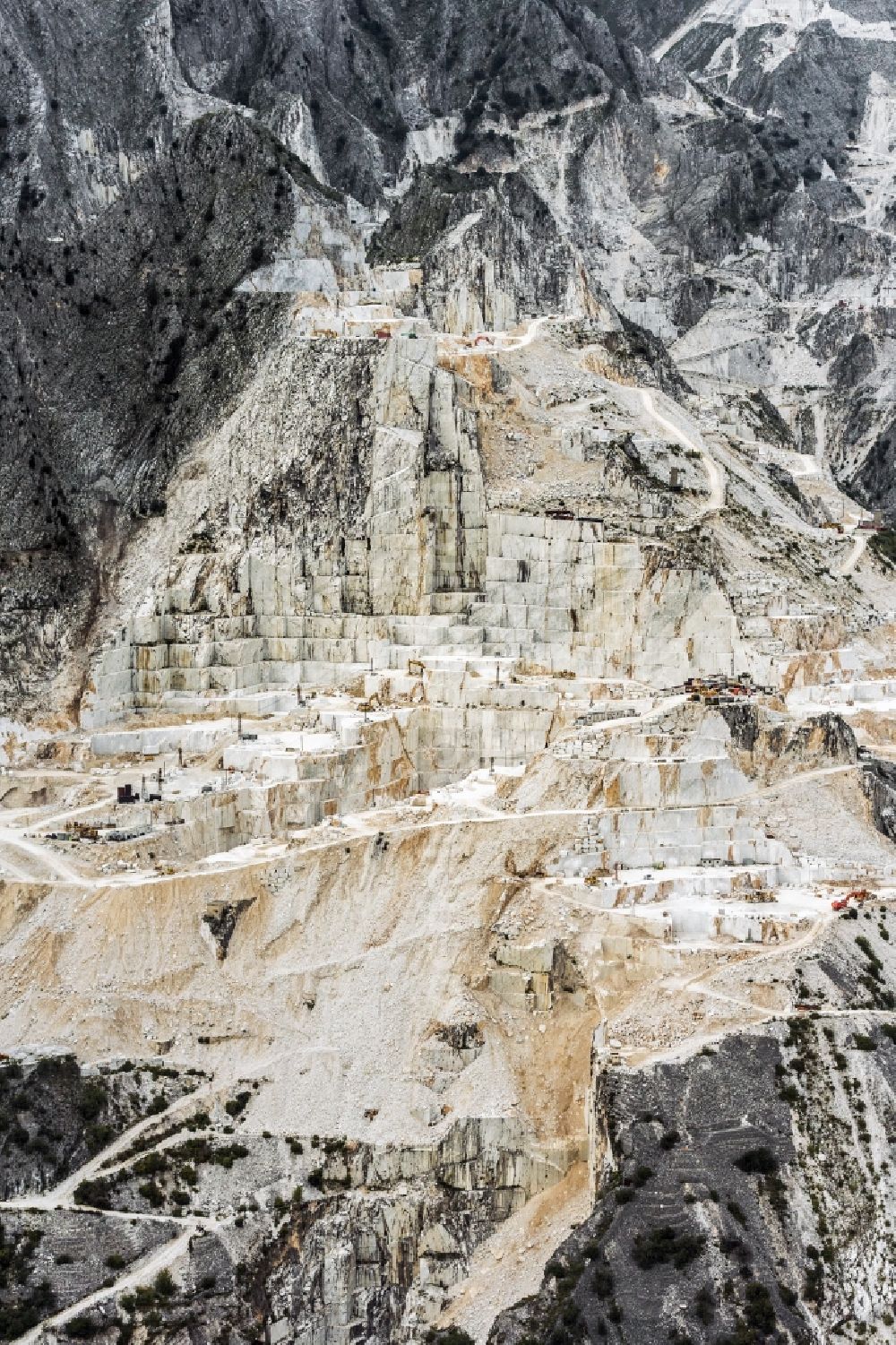 Carrara from the bird's eye view: Sand quarry on the suburbs of Carrara in Tuscany in Italy