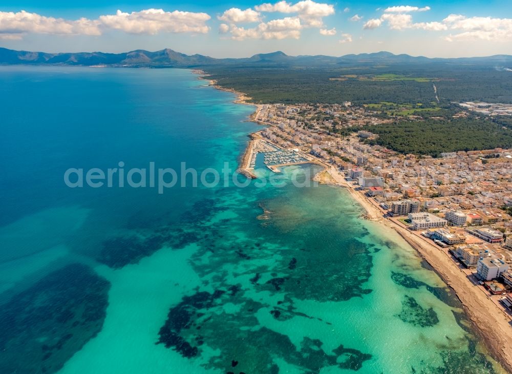 Aerial image Can Picafort - Beach landscape along the and Marina in Can Picafort in Balearic island of Mallorca, Spain