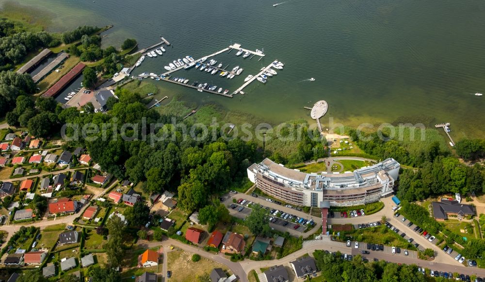 Göhren-Lebbin from the bird's eye view: Sand and beach landscape on the pier of Hotel Iberotel Fleesensee in Goehren-Lebbin in the state Mecklenburg - Western Pomerania