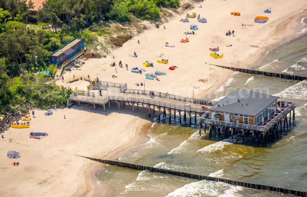 Ustronie Morskie from the bird's eye view: Sand and beach landscape on the pier of Baltic Sea in Ustronie Morskie in West Pomerania, Poland