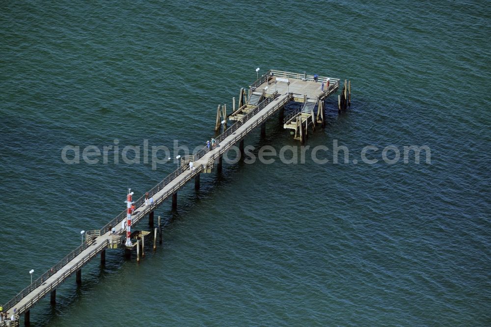 Aerial image Wustrow - Sand and beach landscape on the pier of baltic see in Wustrow in the state Mecklenburg - Western Pomerania