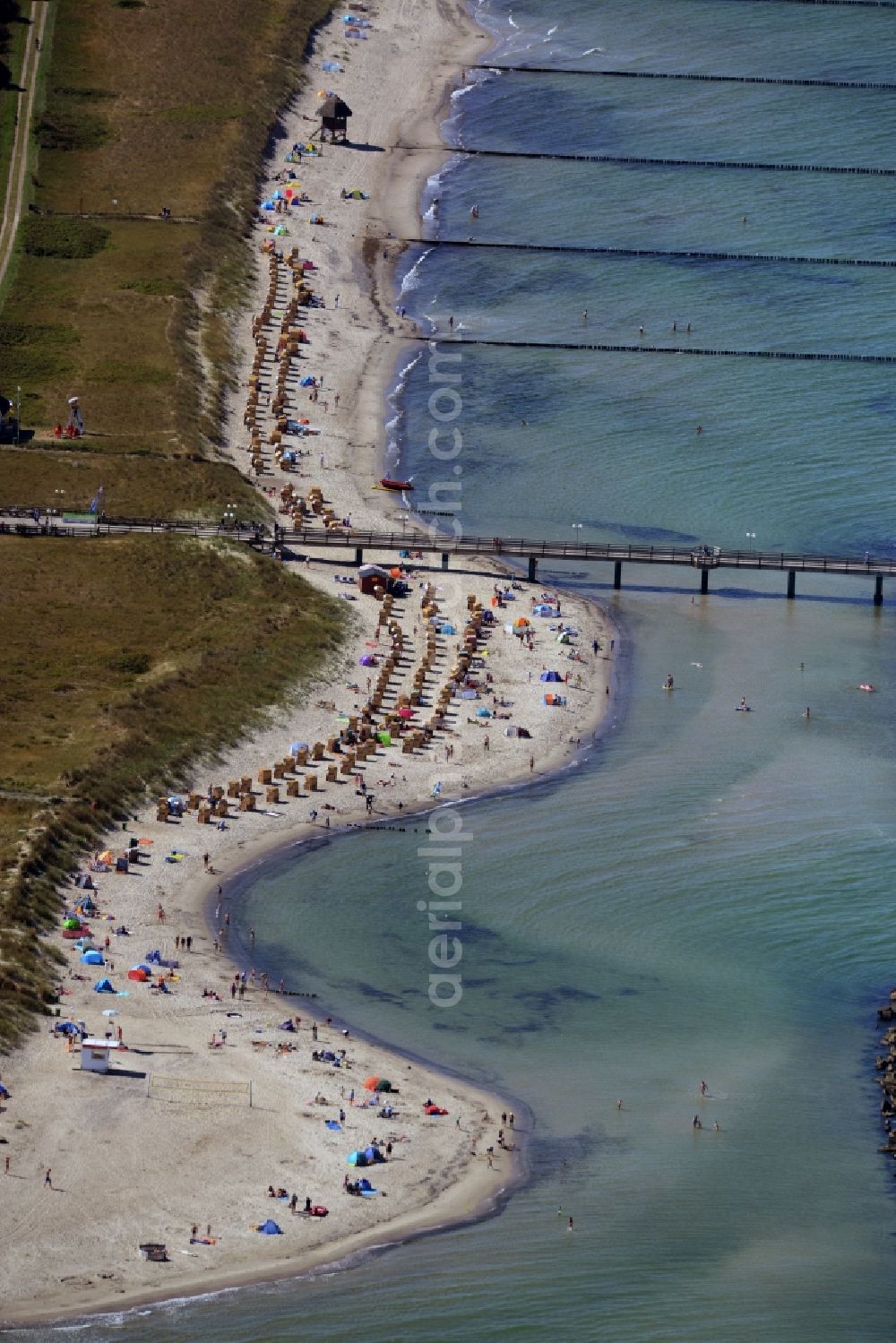 Aerial image Wustrow - Sand and beach landscape on the pier of baltic see in Wustrow in the state Mecklenburg - Western Pomerania