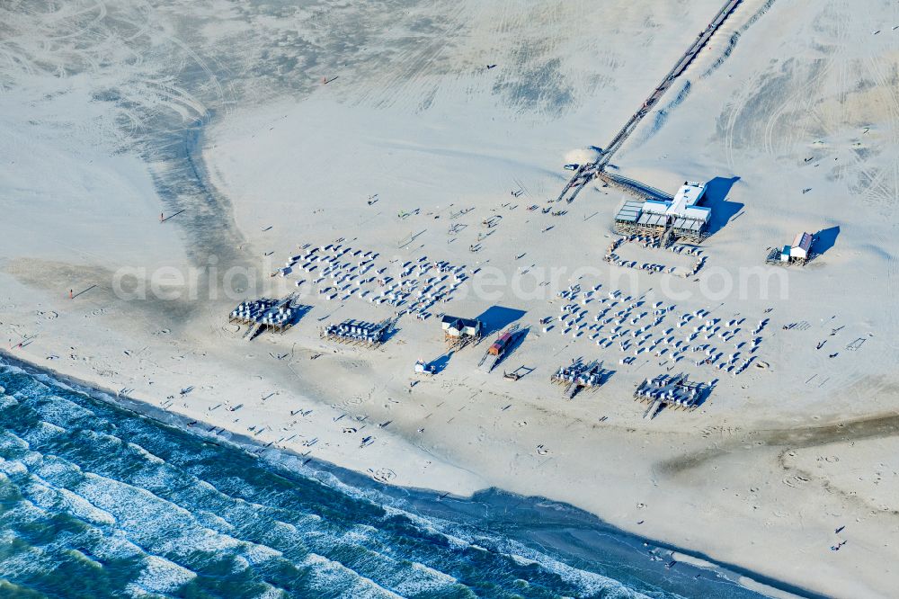 Sankt Peter-Ording from above - Sandy beach landscape at the pier and beach restaurant in the district of Sankt Peter-Bad in Sankt Peter-Ording in the state Schleswig-Holstein, Germany