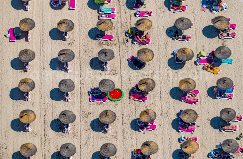 Cala Anguila-Cala Mendia from above - Beach landscape along the with umbrella - rows on CALA Estany d'en Mas in Cala Anguila-Cala Mendia in Balearic island of Mallorca, Spain