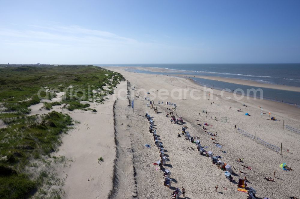 Aerial photograph Norderney - Sandy beach with beach chair countryside on the North Sea coast of the island of Norderney in Lower Saxony