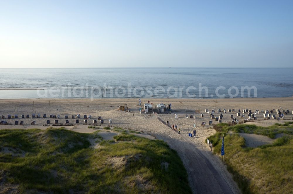 Aerial image Norderney - Sandy beach with beach chair countryside on the North Sea coast of the island of Norderney in Lower Saxony