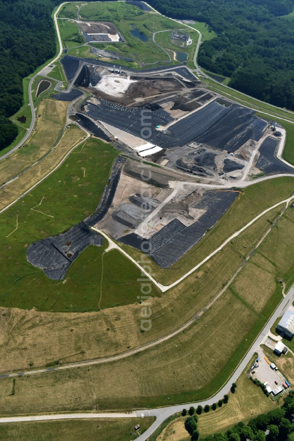 Aerial image Selmsdorf - Renovation, sealing and restoration work on the site of the refurbished landfill Deponie Ihlenberg in Selmsdorf in the state Mecklenburg - Western Pomerania, Germany