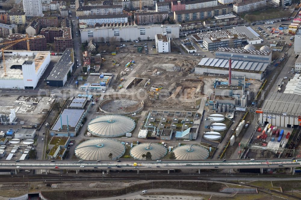 Basel from above - New construction site and extension of the sewage treatment basins and purification stages of the plant of ProRheno in the district Kleinhueningen in Basel, Switzerland