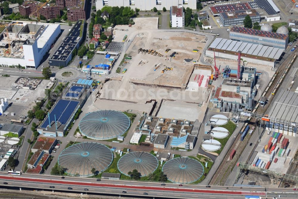 Basel from the bird's eye view: New construction site and extension of the sewage treatment basins and purification stages of the plant of ProRheno in the district Kleinhueningen in Basel, Switzerland