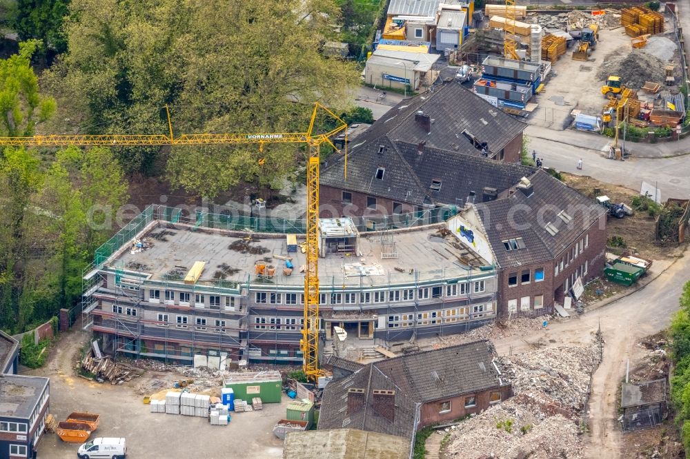 Aerial photograph Herne - Construction site for reconstruction and modernization and renovation of the building Heitkamp-Villa on Langekampstrasse in Herne at Ruhrgebiet in the state North Rhine-Westphalia, Germany