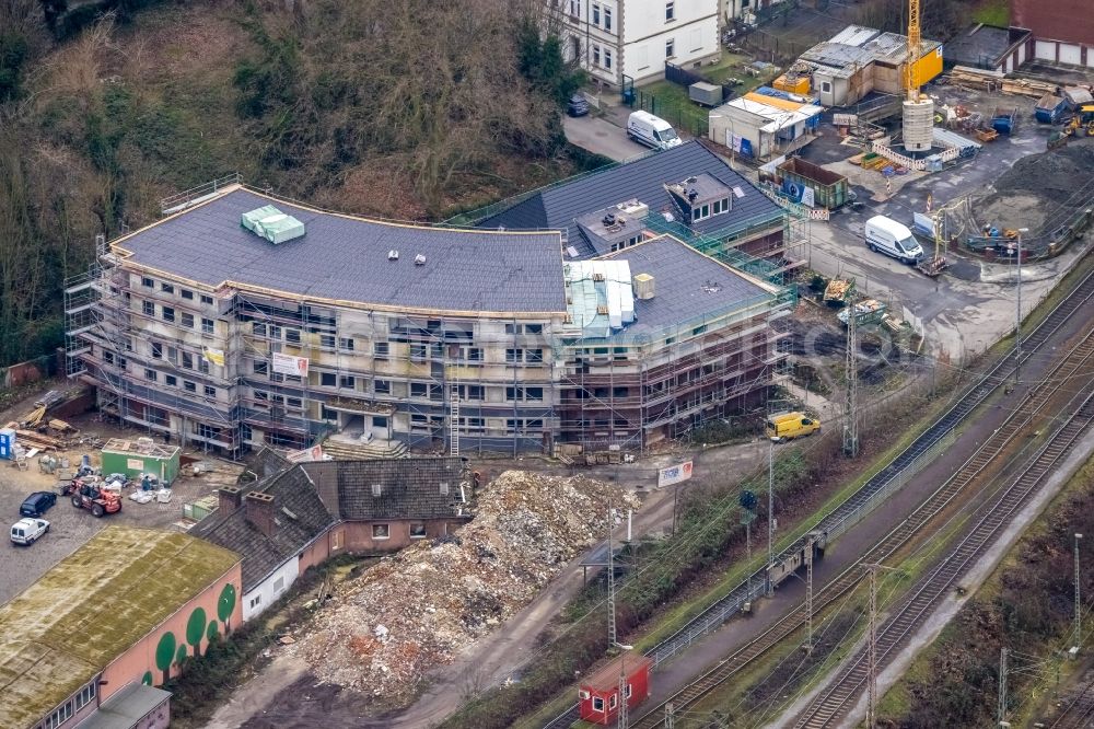 Herne from the bird's eye view: Construction site for reconstruction and modernization and renovation of the building Heitkamp-Villa on Langekampstrasse in Herne at Ruhrgebiet in the state North Rhine-Westphalia, Germany