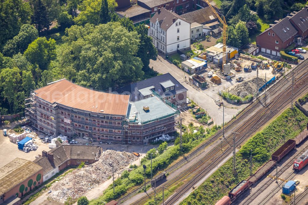 Herne from the bird's eye view: Construction site for reconstruction and modernization and renovation of the building Heitkamp-Villa on Langekampstrasse in Herne at Ruhrgebiet in the state North Rhine-Westphalia, Germany