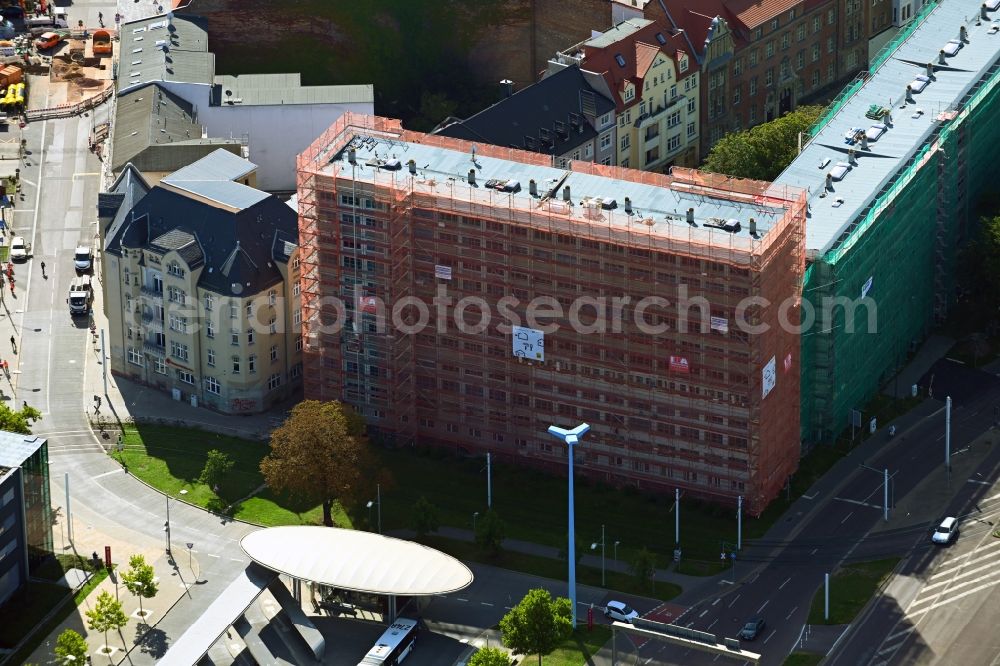 Halle (Saale) from the bird's eye view: Construction site for reconstruction and modernization and renovation of a building of multi-family apartments in Halle (Saale) in the state Saxony-Anhalt, Germany