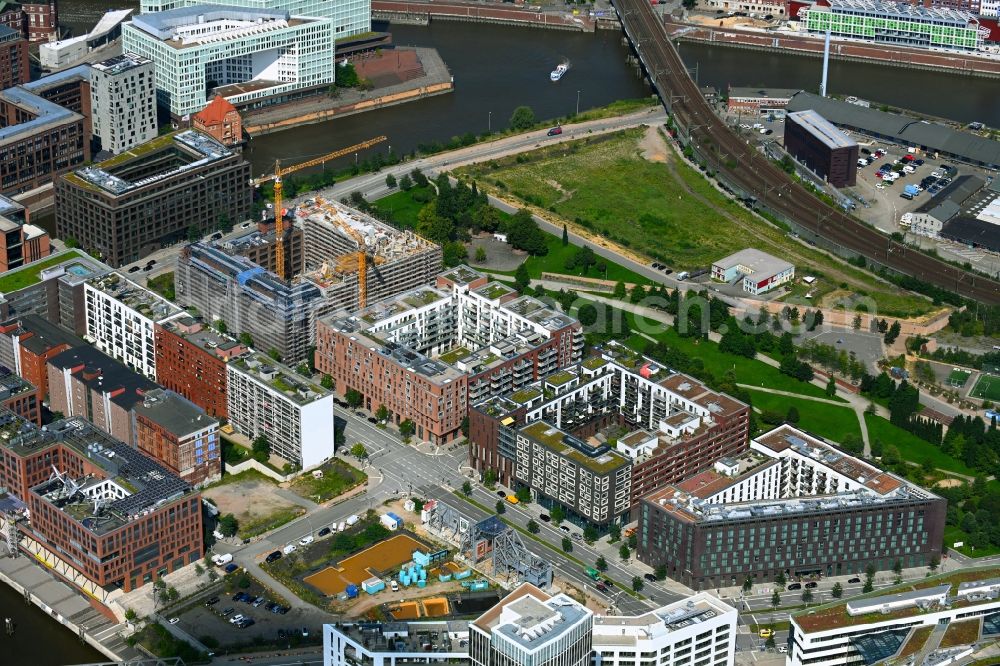 Hamburg from the bird's eye view: Construction site for reconstruction and modernization and renovation of a building and construction of new building next at Kulturcompagnie on Shanghaiallee in the district HafenCity in Hamburg, Germany