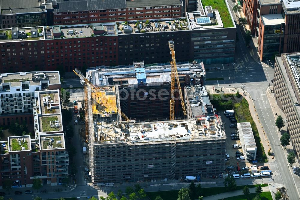 Aerial photograph Hamburg - Construction site for reconstruction and modernization and renovation of a building and construction of new building next at Kulturcompagnie on Shanghaiallee in the district HafenCity in Hamburg, Germany